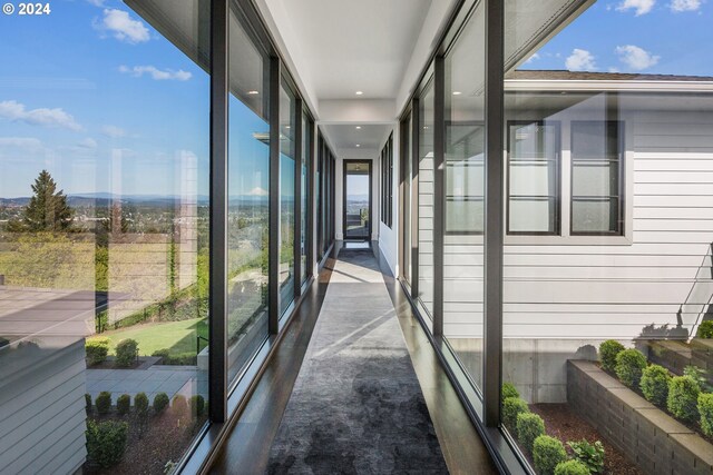 hallway with expansive windows