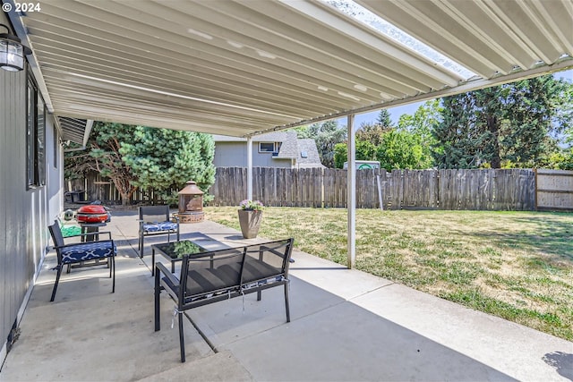 view of patio / terrace with an outdoor living space with a fireplace