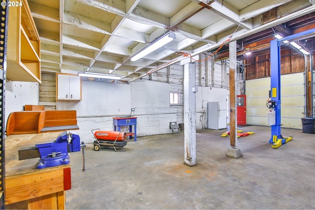 basement featuring white refrigerator