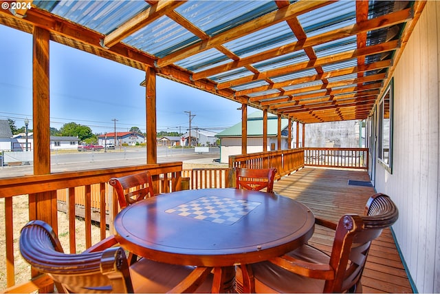 wooden deck featuring a pergola