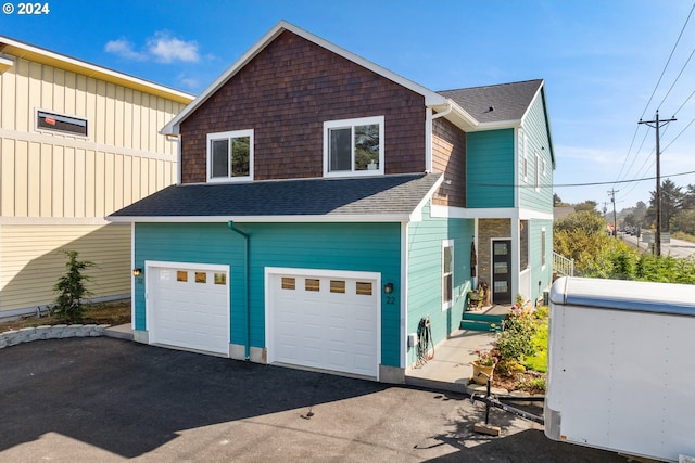 view of front of property featuring a garage