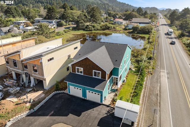 bird's eye view featuring a water and mountain view