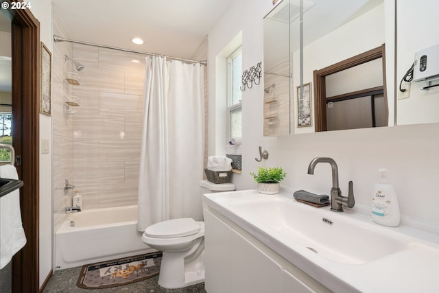 full bathroom with vanity, a healthy amount of sunlight, shower / tub combo with curtain, and toilet