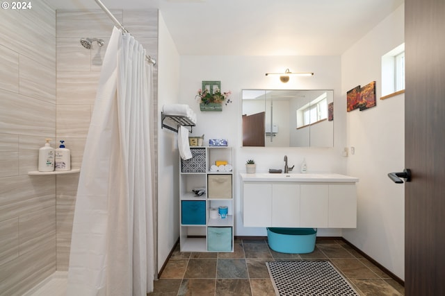 bathroom featuring vanity and a shower with curtain