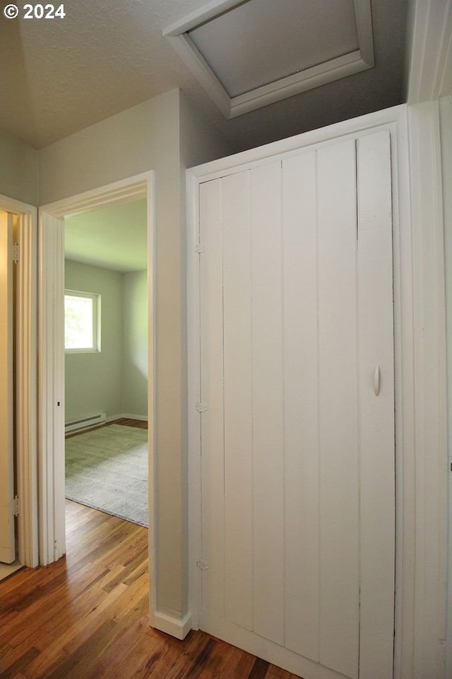 closet featuring a baseboard radiator