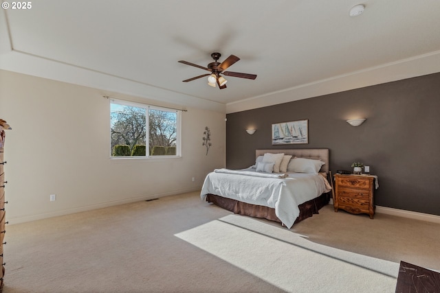 bedroom with light colored carpet, ceiling fan, and ornamental molding