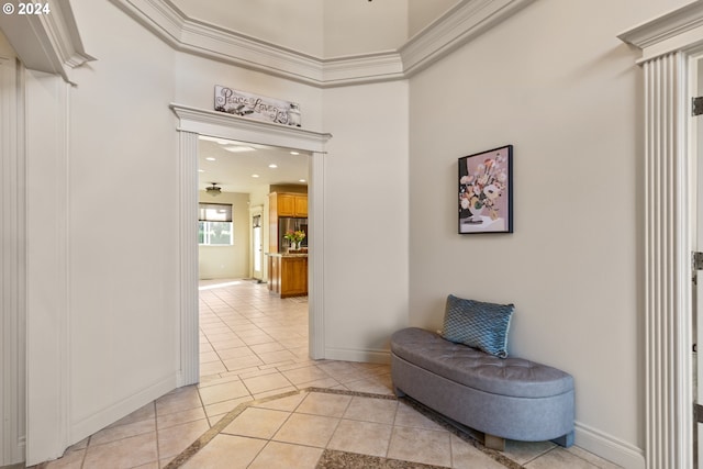 hall featuring light tile patterned floors