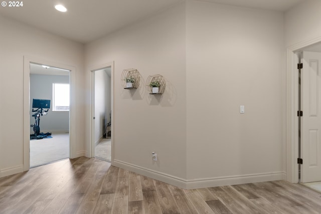 hallway featuring light wood-type flooring