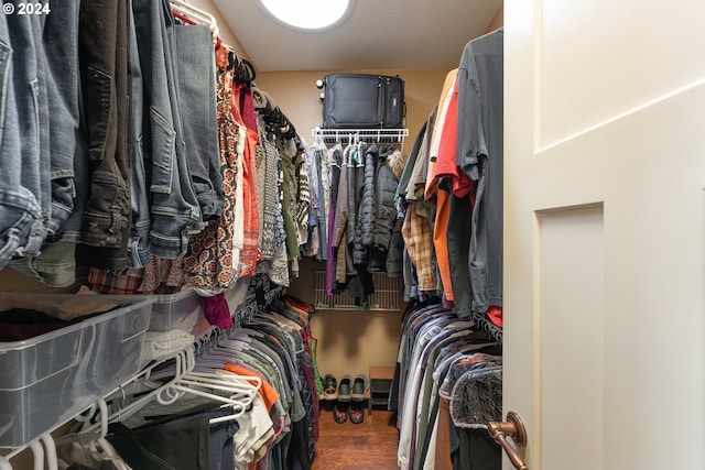 spacious closet featuring hardwood / wood-style floors