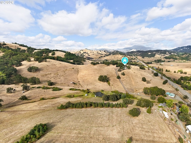 bird's eye view with a rural view and a mountain view