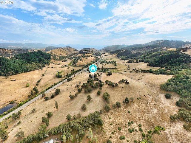 bird's eye view with a mountain view