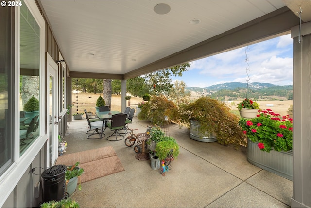 view of patio with a mountain view