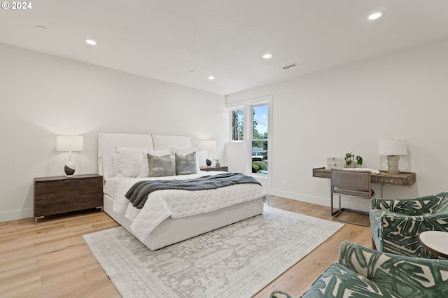 bedroom with light hardwood / wood-style flooring