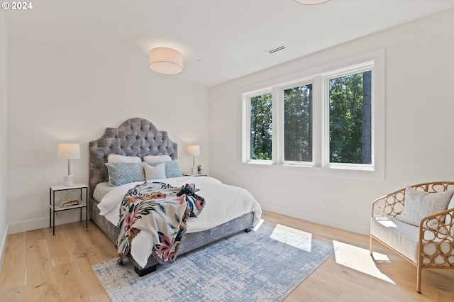 bedroom with light wood-type flooring