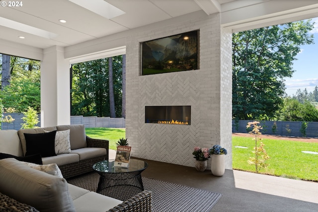 exterior space featuring an outdoor brick fireplace