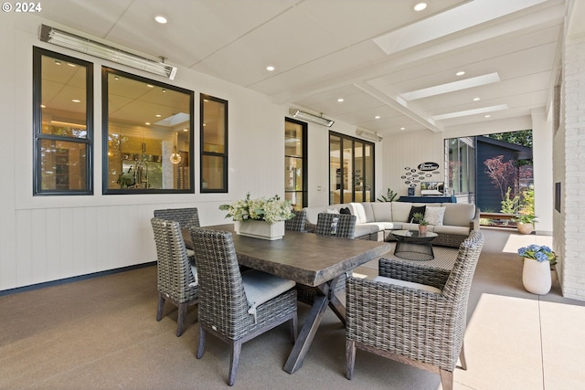 dining room featuring a healthy amount of sunlight and french doors