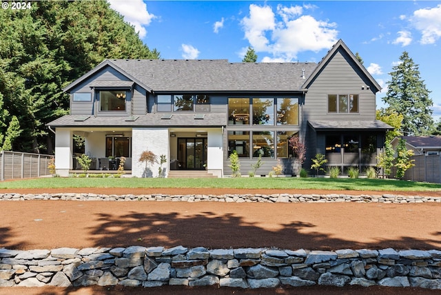 view of front of house with a front lawn