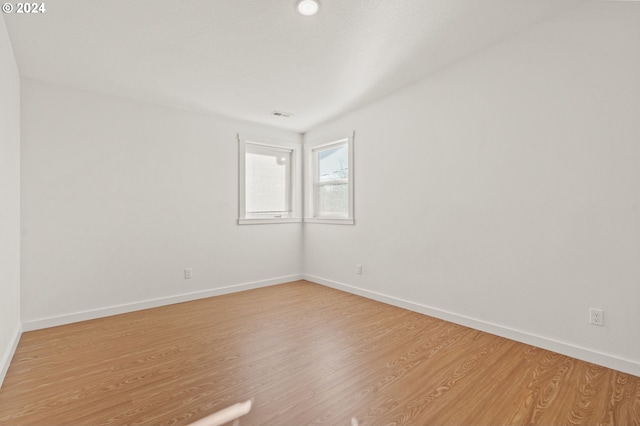 empty room featuring hardwood / wood-style flooring