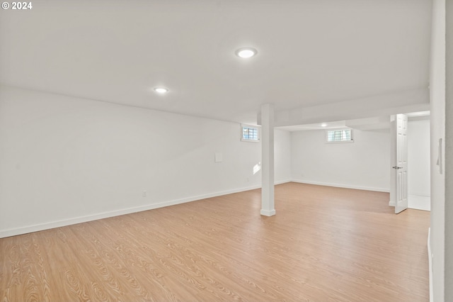 basement featuring light hardwood / wood-style floors