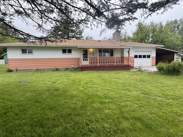 exterior space with a front yard and a garage