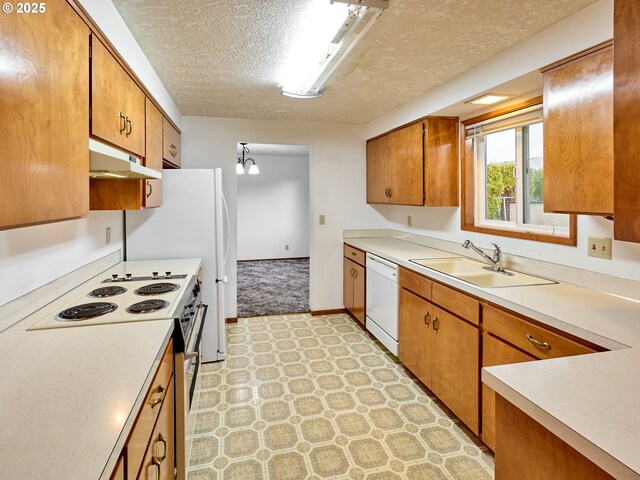 spare room with carpet floors and a textured ceiling