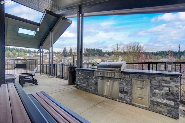 view of patio / terrace with exterior kitchen and area for grilling