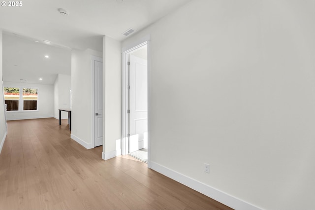 hallway featuring light wood-type flooring