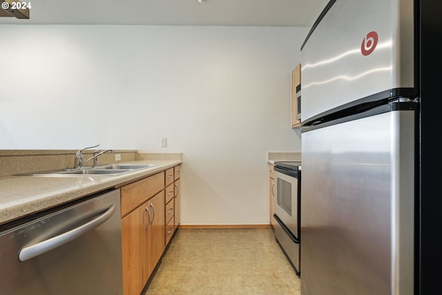 kitchen featuring sink and appliances with stainless steel finishes