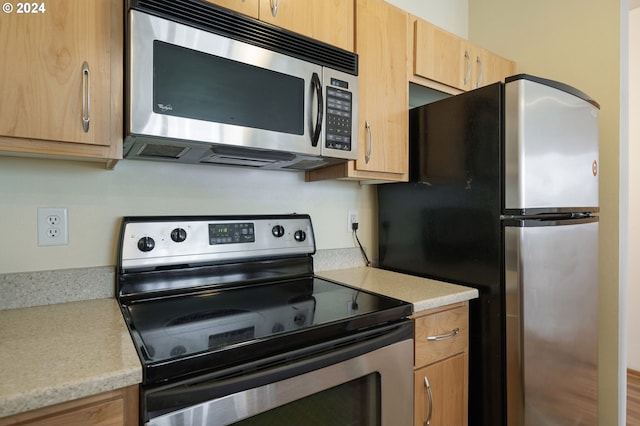 kitchen featuring appliances with stainless steel finishes