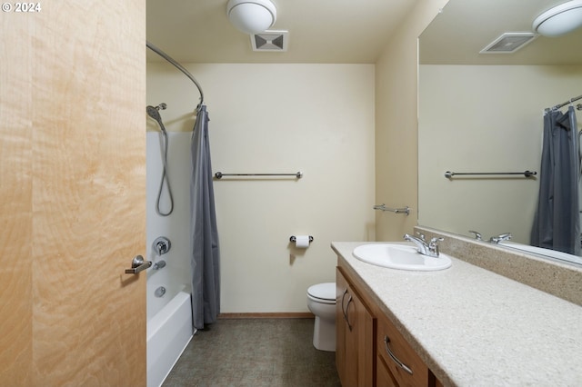 full bathroom with vanity, toilet, and shower / tub combo with curtain