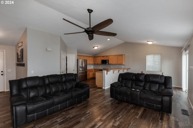 living room featuring ceiling fan, dark hardwood / wood-style flooring, and lofted ceiling