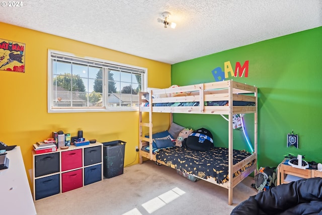 carpeted bedroom with a textured ceiling