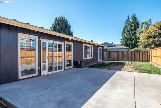 rear view of house featuring a patio area