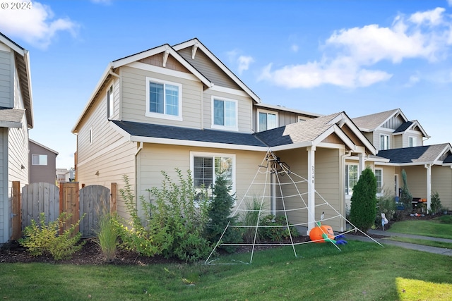 craftsman house with a front yard