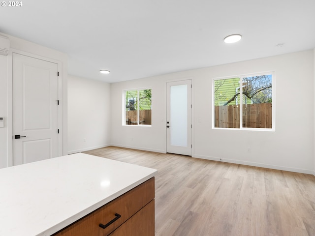 kitchen with light hardwood / wood-style floors