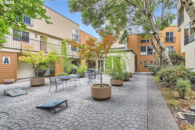 view of patio with a balcony