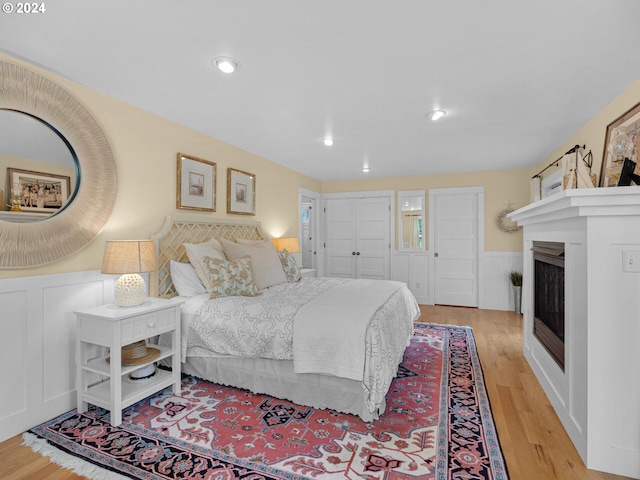 bedroom with light hardwood / wood-style flooring