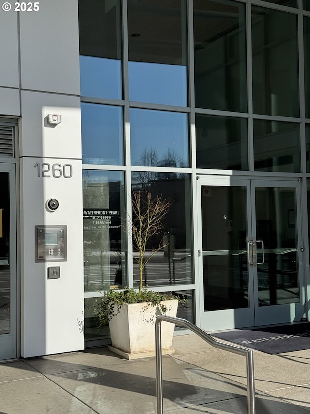 entrance to property featuring french doors