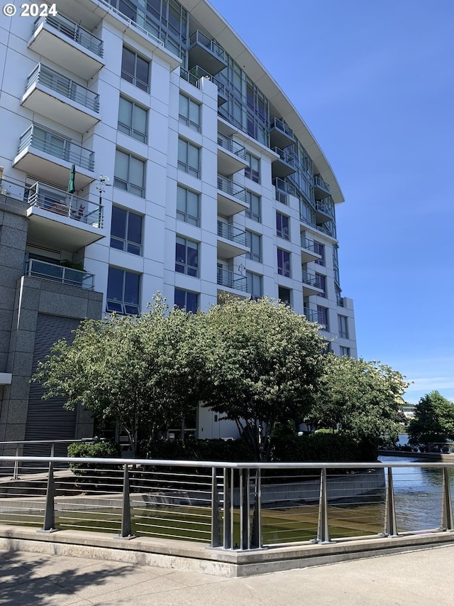 view of building exterior featuring a water view