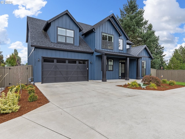 view of front of property featuring a garage