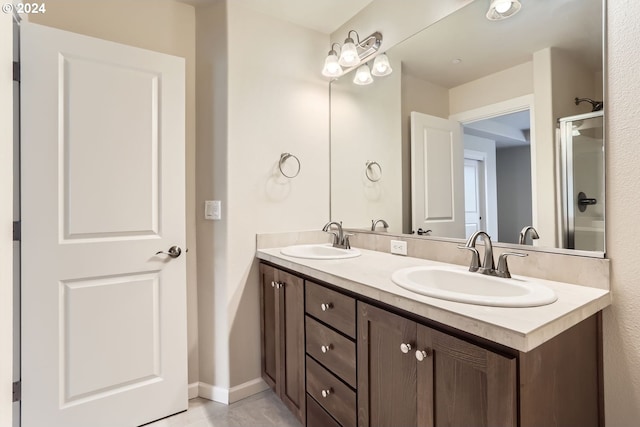 bathroom featuring vanity and tile patterned floors