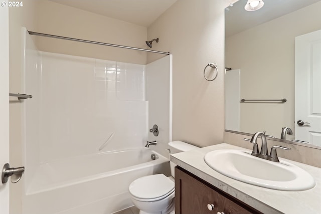 full bathroom featuring vanity, toilet, and washtub / shower combination