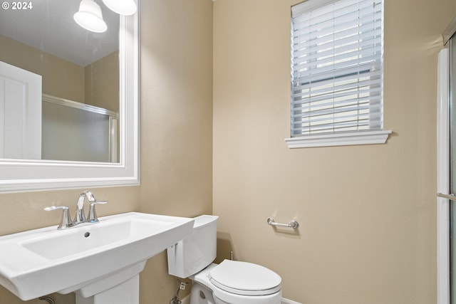 bathroom with sink and toilet