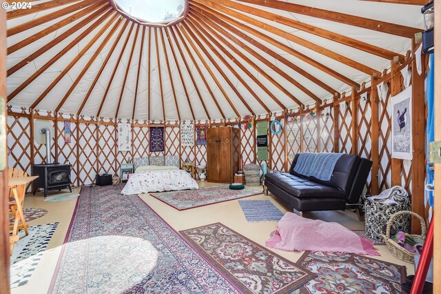 23175 NE Ridge Rd, Gaston, OR 97119 - living area with a wood stove and lofted ceiling