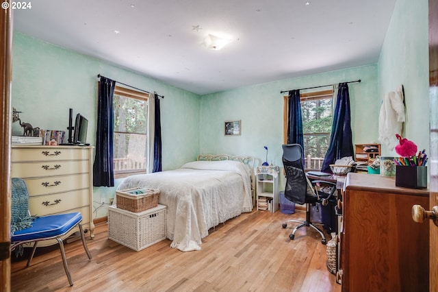 bedroom featuring light wood-type flooring