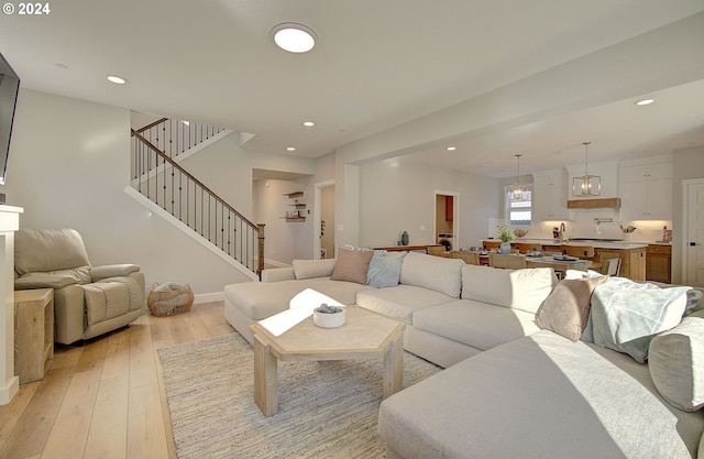 living room with light hardwood / wood-style flooring