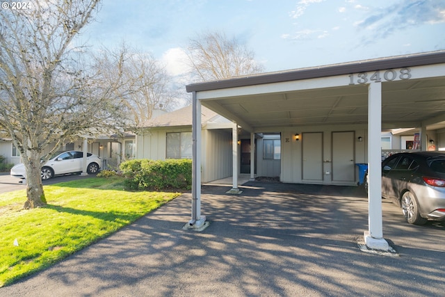 view of parking / parking lot with a carport