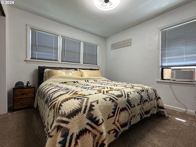 carpeted bedroom with cooling unit