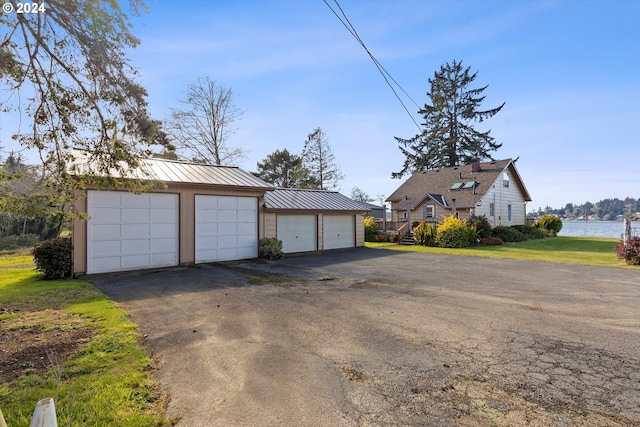 3770 NE 12th St, Otis, OR 97368 - detached garage featuring a water view