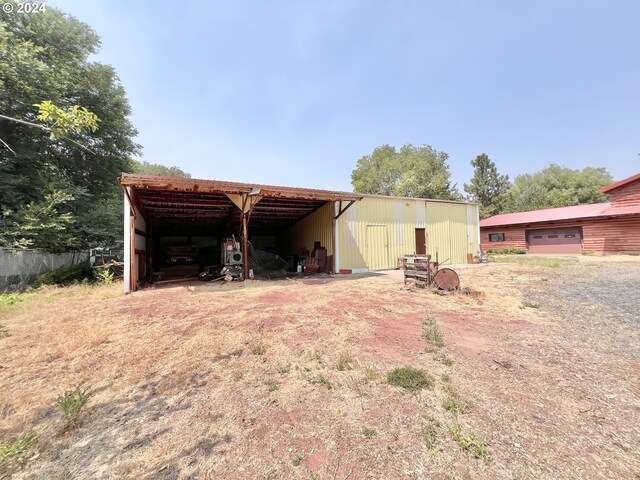 view of outdoor structure with a garage